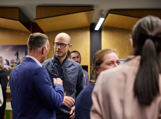 People discussing in a networking event